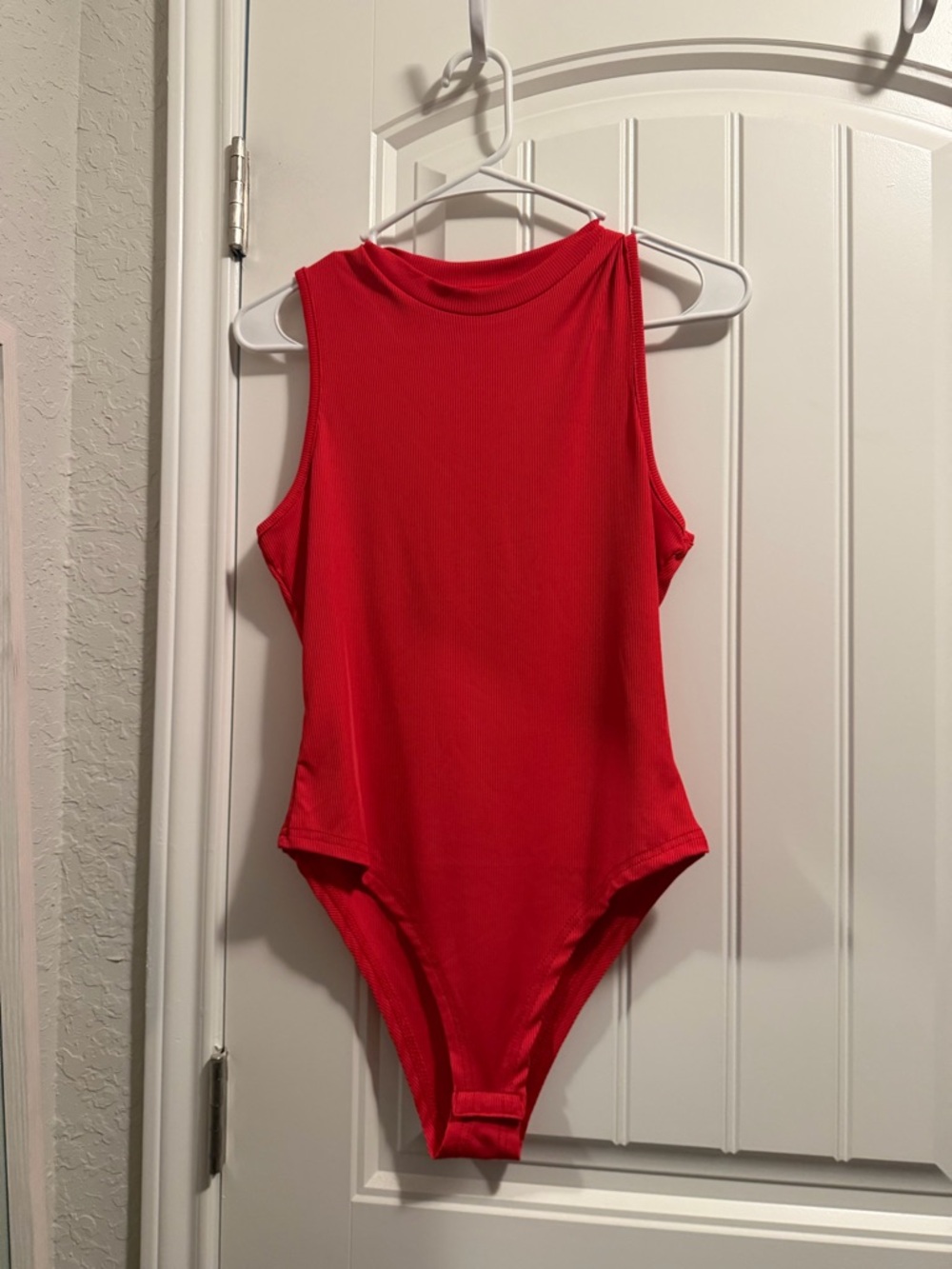 Red Sleeveless One-Piece Bodysuit